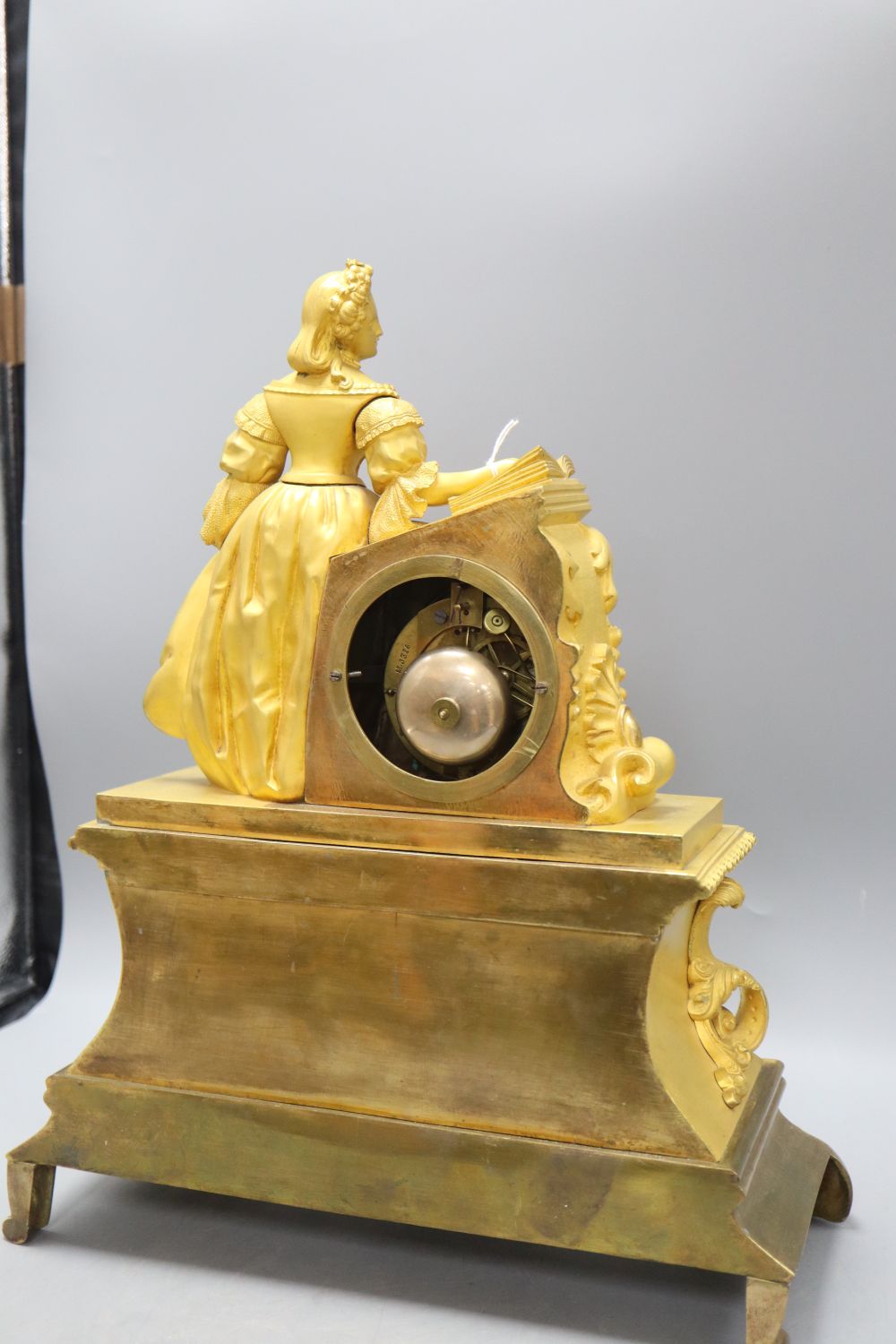 A French ormolu clock with a surmount of Madam Sevigne, height 45cm